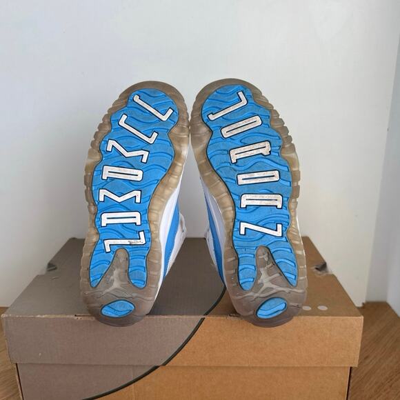 09469772-6e33-421b-8eea-  Nike Air Jordan 11 Retro Low ‘UNC’ Kids Sneakers - SZ 13 C
